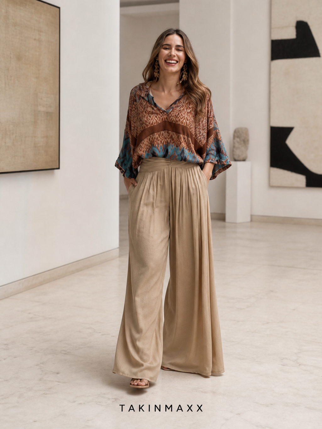 TAKINMAXX Mumbai set in a contemporary gallery